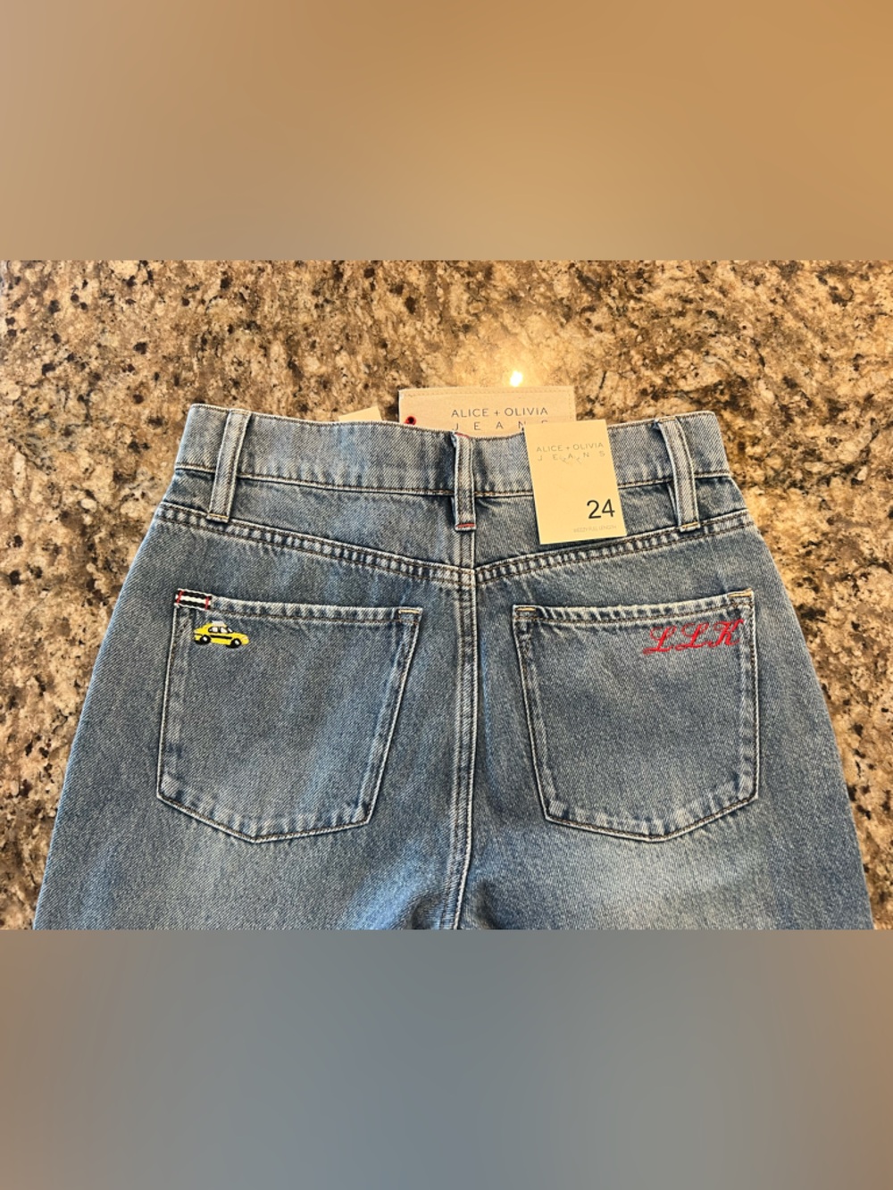 Alice + Olivia Light Blue High-Rise Jeans with Embroidered Back Pockets